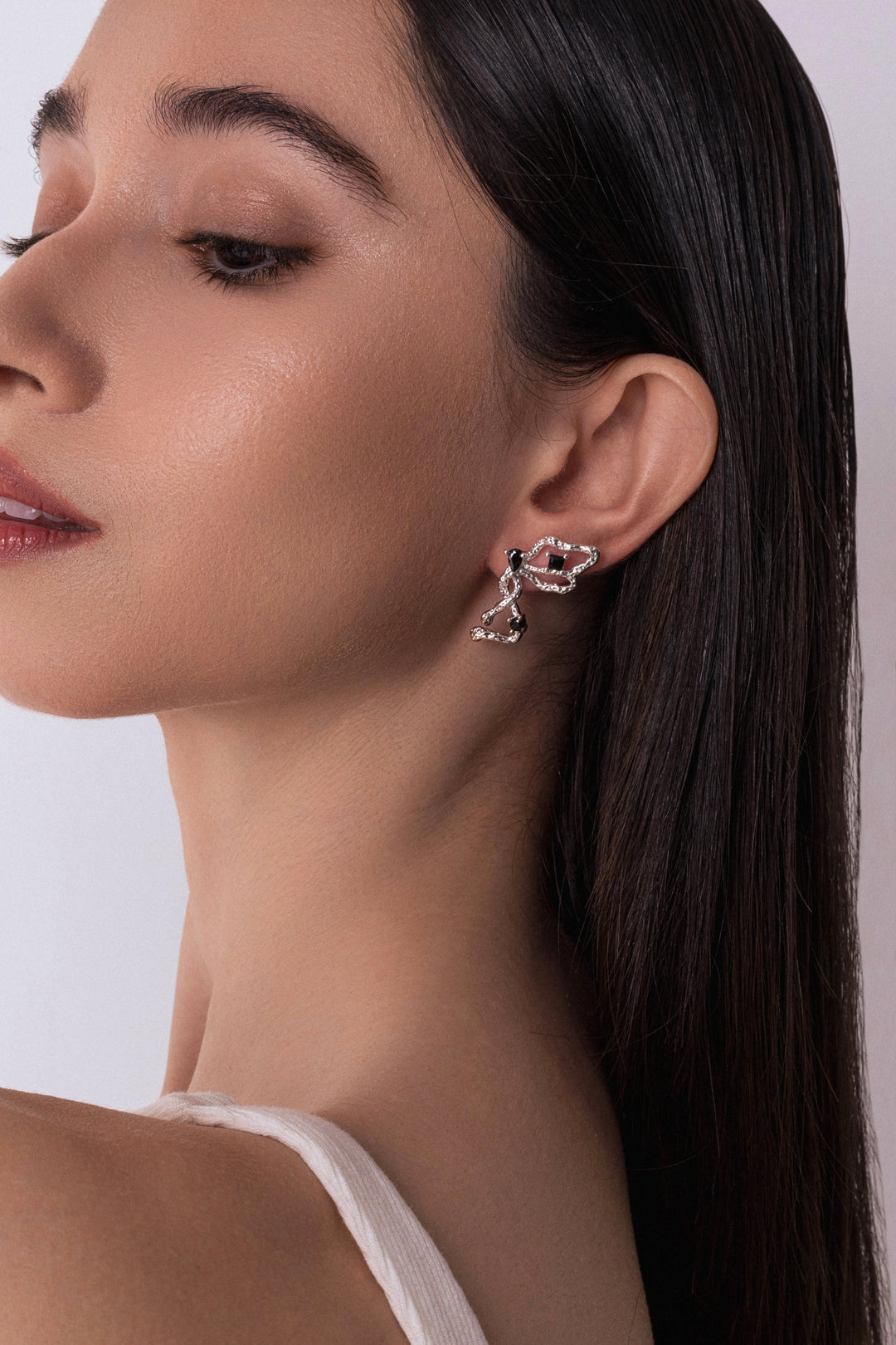 Maneater Earrings In Silver