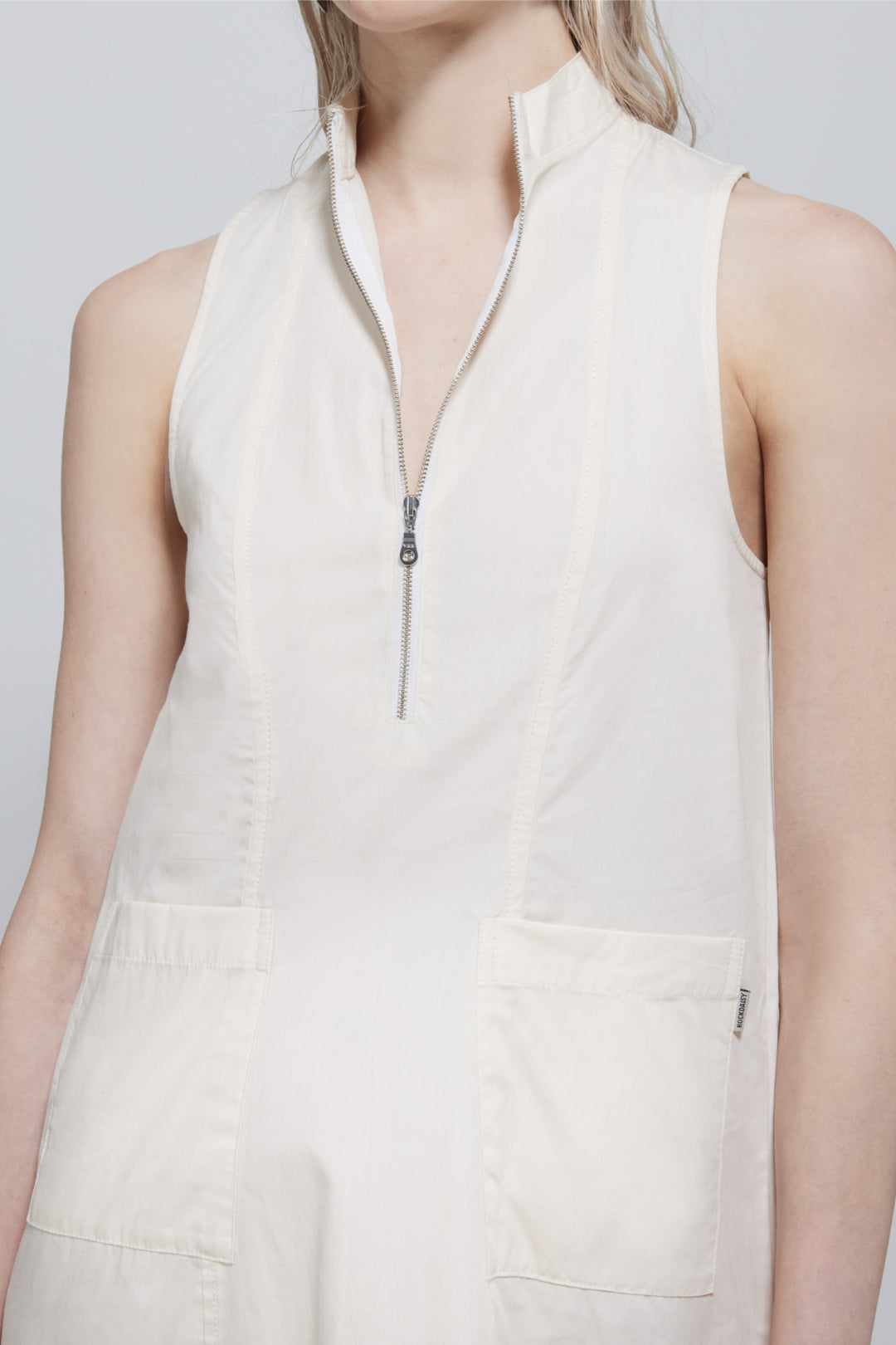 Amelie Sleeveless Zipped Dress In Cream