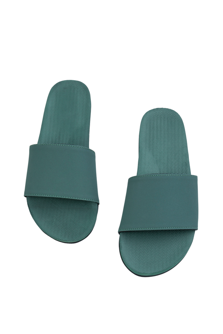 Indosole Women’s ESSNTLS Slides in Leaf, available on ZERRIN with free Singapore shipping