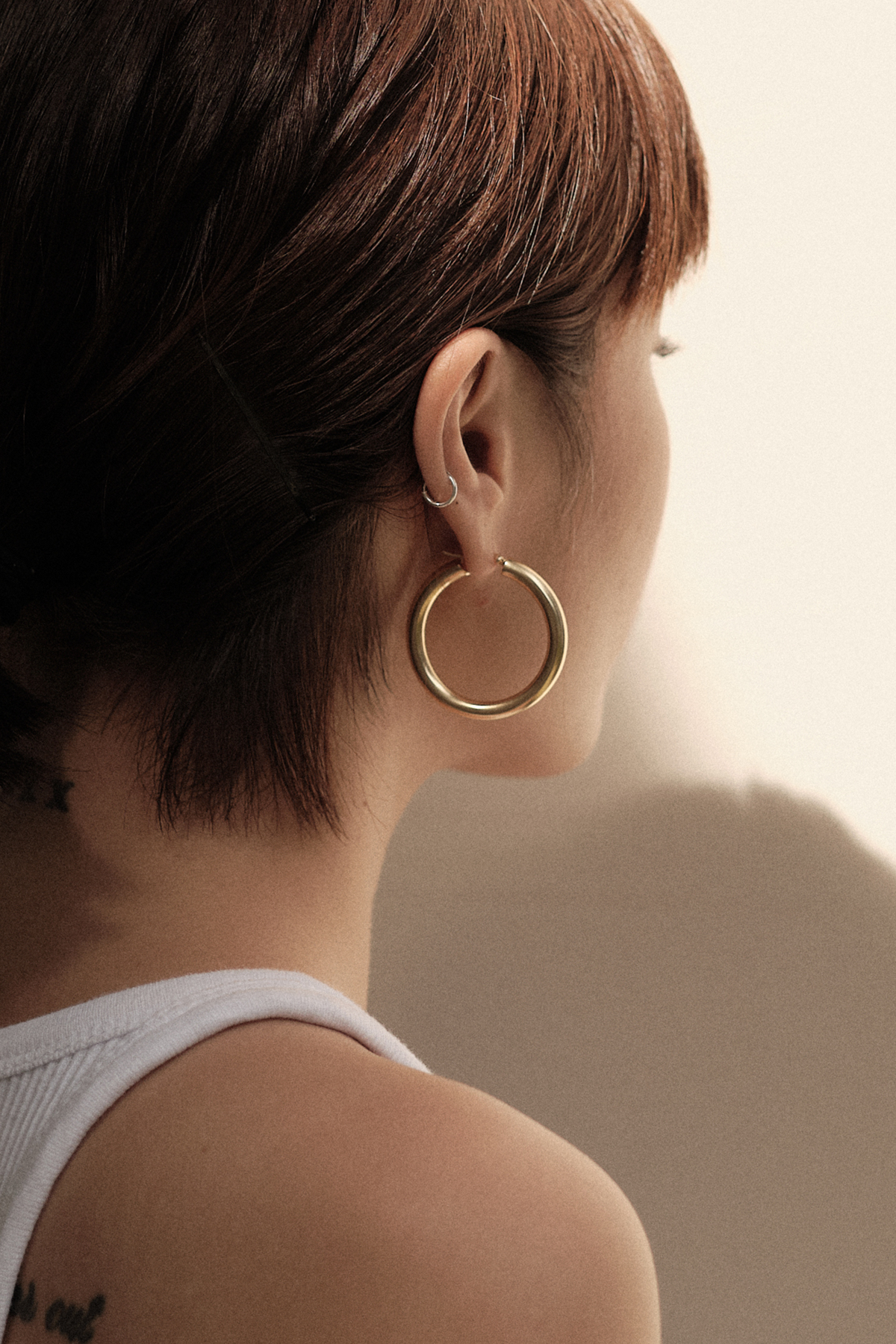 Back view of Pyar Jupiter Gold Hinged Hoop Earrings, available on ZERRIN with free shipping in Singapore