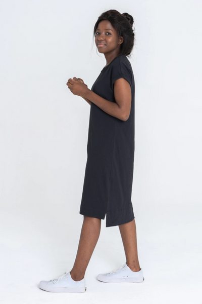 Side view of Dorsu Rolled Sleeve T-shirt Dress in Black, available on ZERRIN