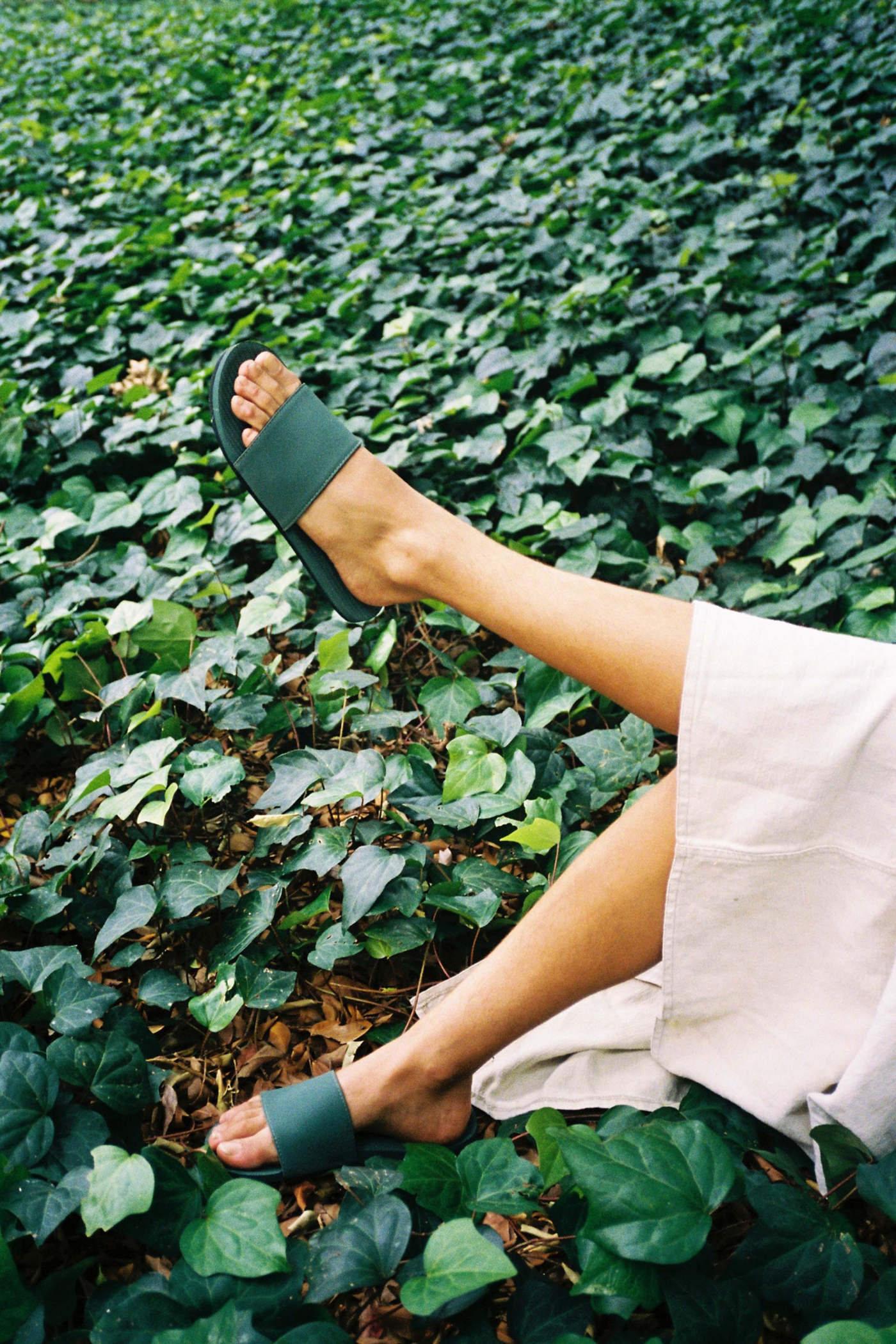 Indosole Women’s ESSNTLS Slides in Leaf, available on ZERRIN with free Singapore shipping
